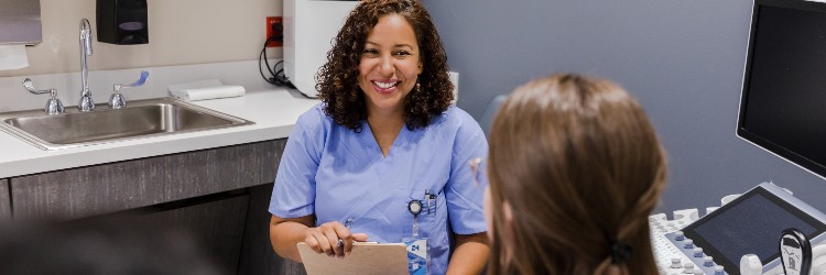 obgyn near syracuse ny image of doctors and medical providers working with patient from crouse medical practice